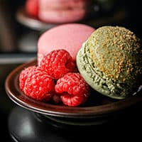 Macarons and raspberries